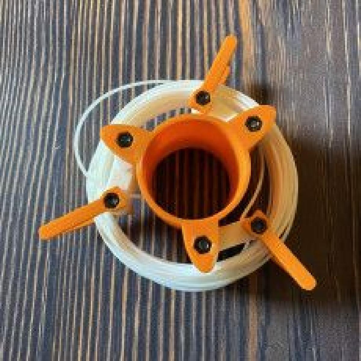 Carretel de filamento de amostra ajustavel
