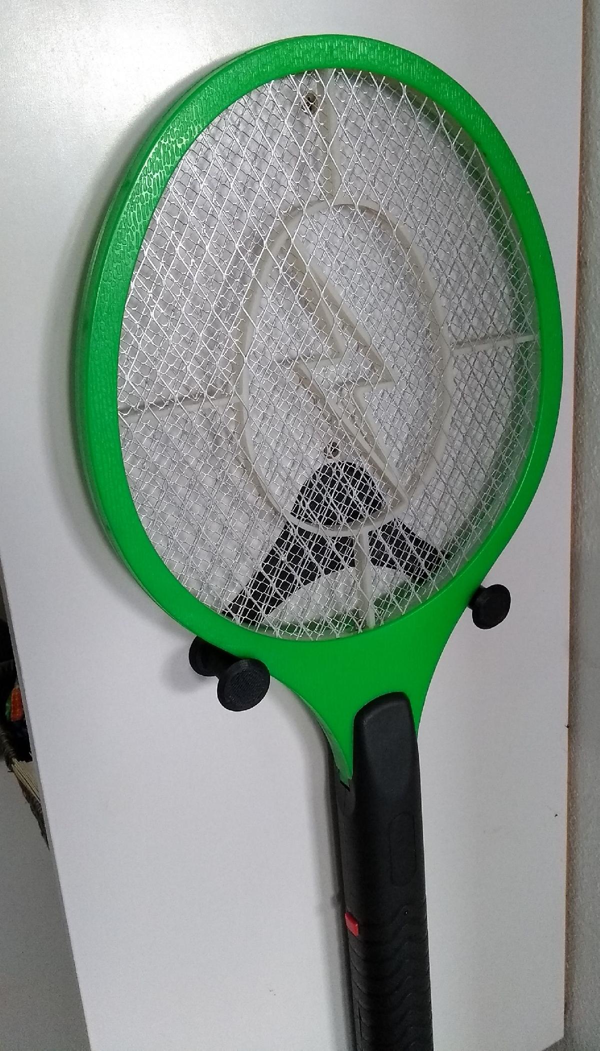 Moscas matam Racket Holder