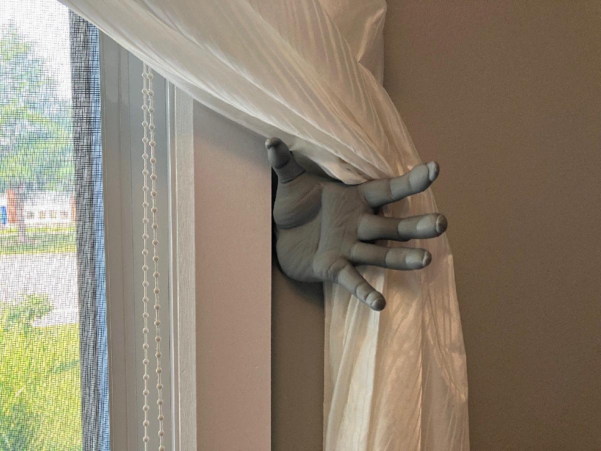 Ganchos de cortina de mao demoniaca