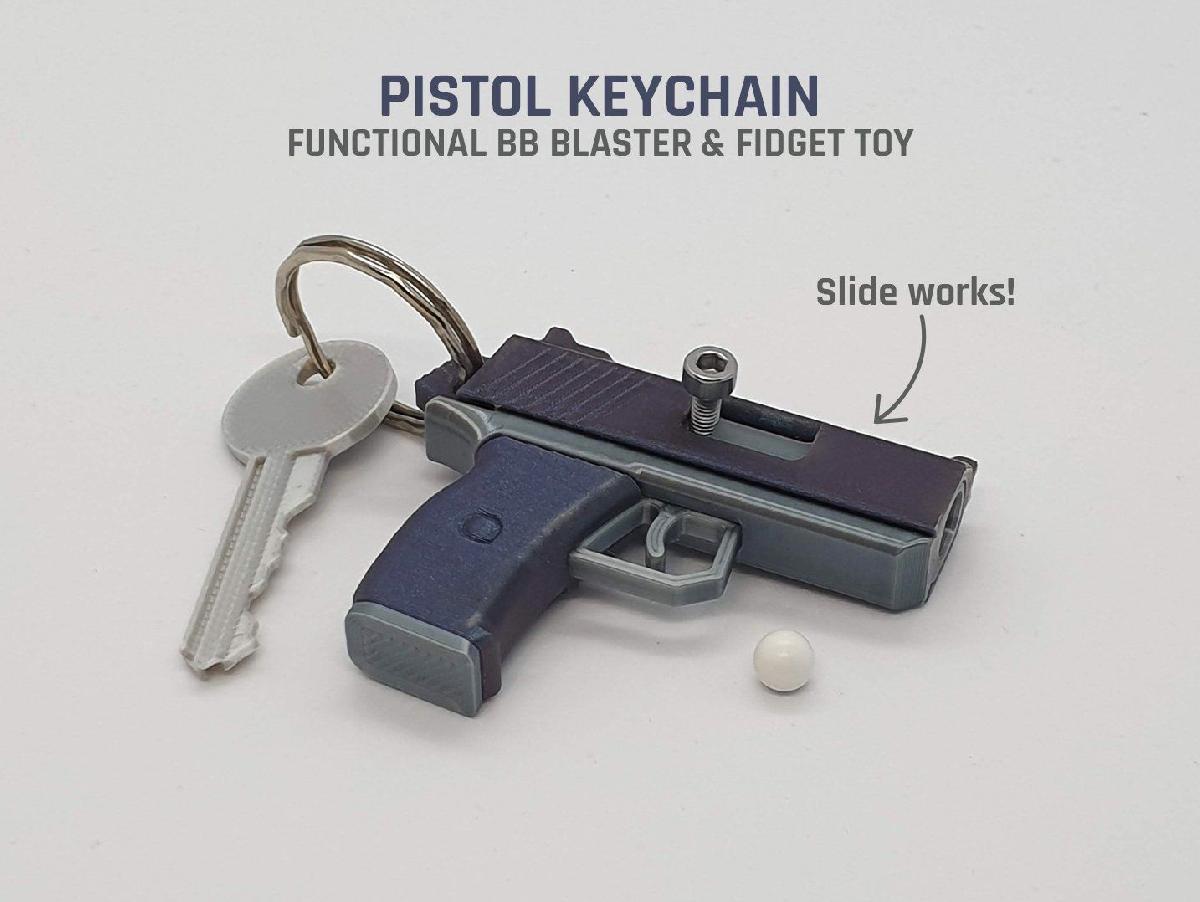 Chaveiro de Pistola — BB Blaster Funcional / Brinquedo Fidget
