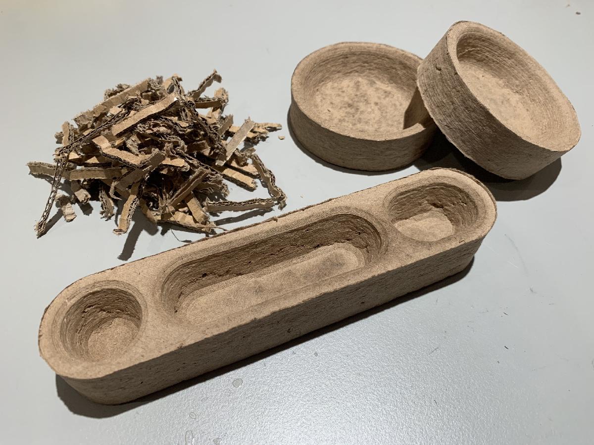 Moldagem de papelao reciclado