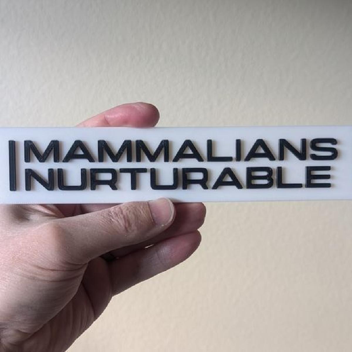 Placa do Departamento de Mamiferos Nutricoes.
