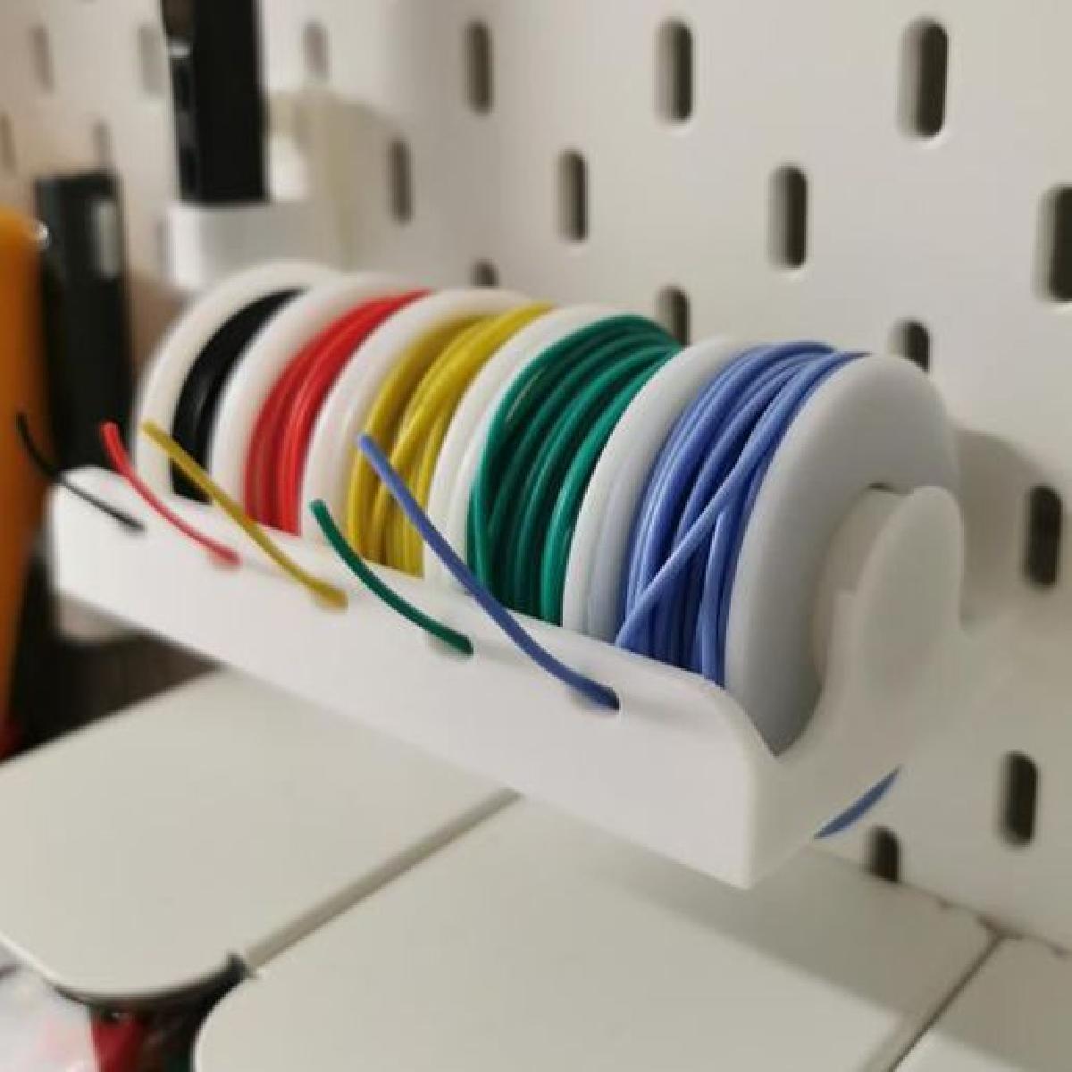 Suporte Skadis para rolos de la.