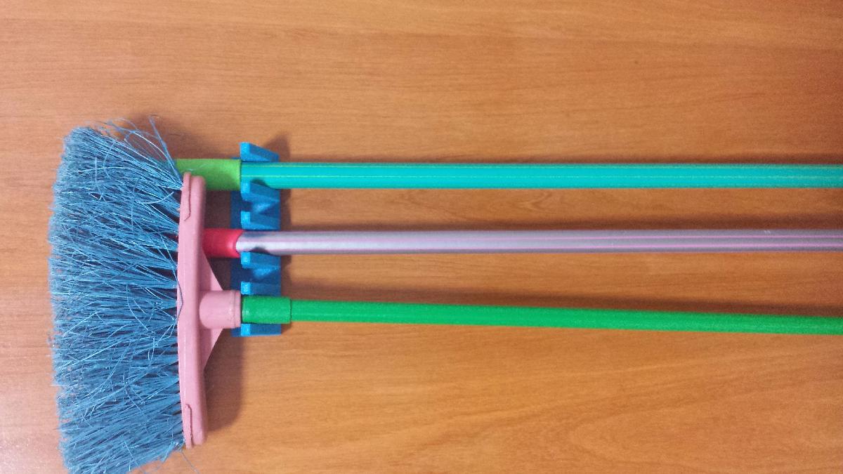 Suporte para vassouras