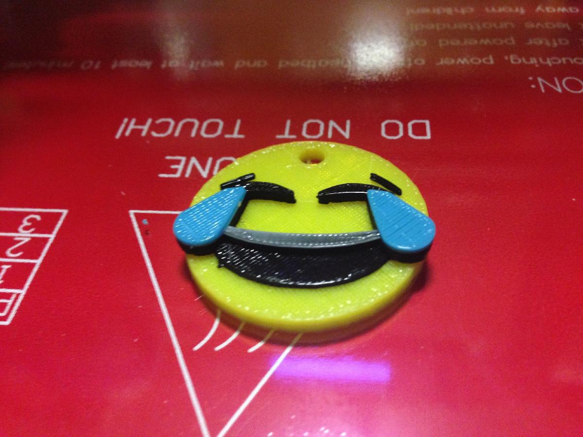 Emoticon de riso com lagrimas. Emoji.