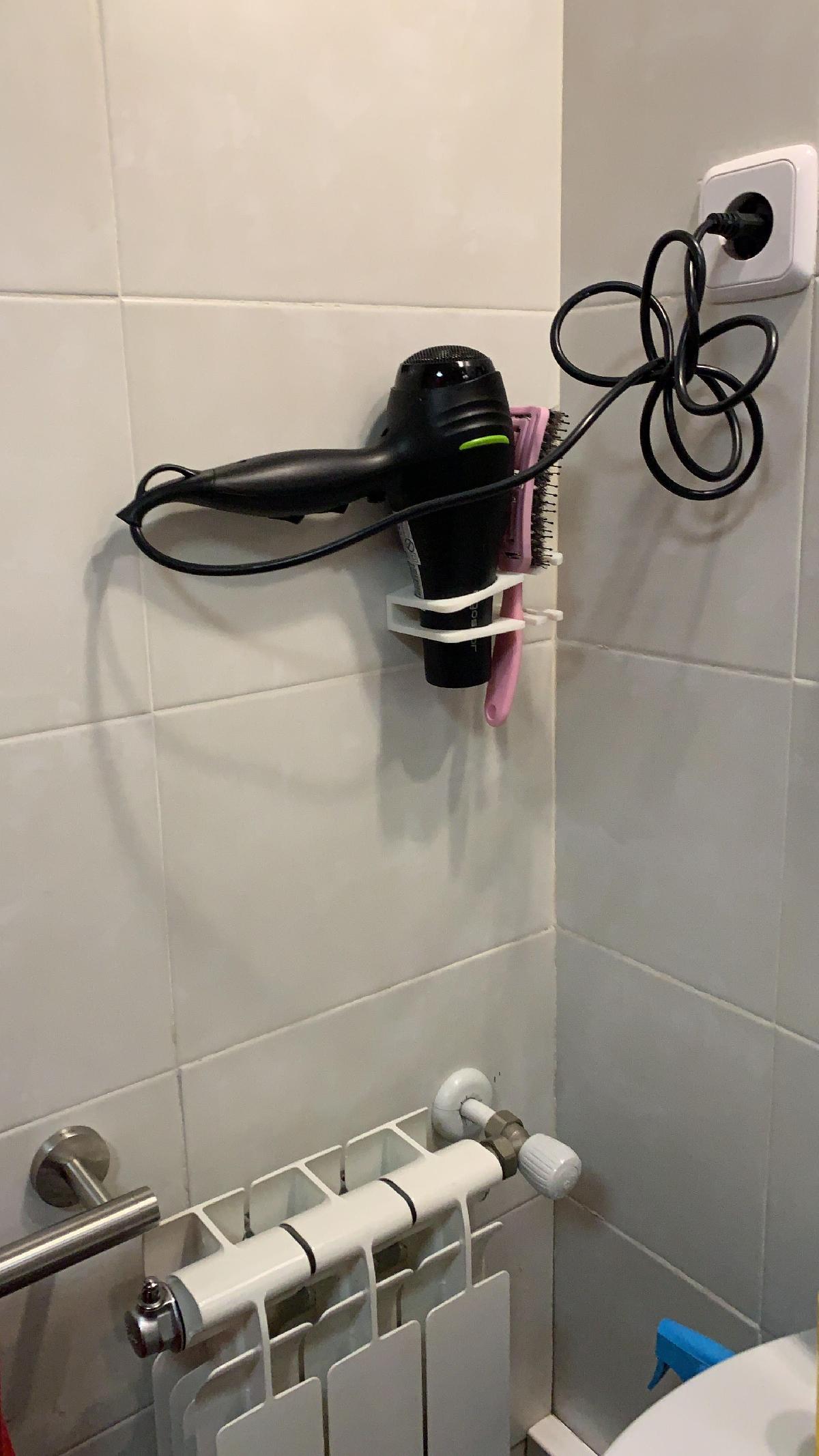 Hair dryer holder