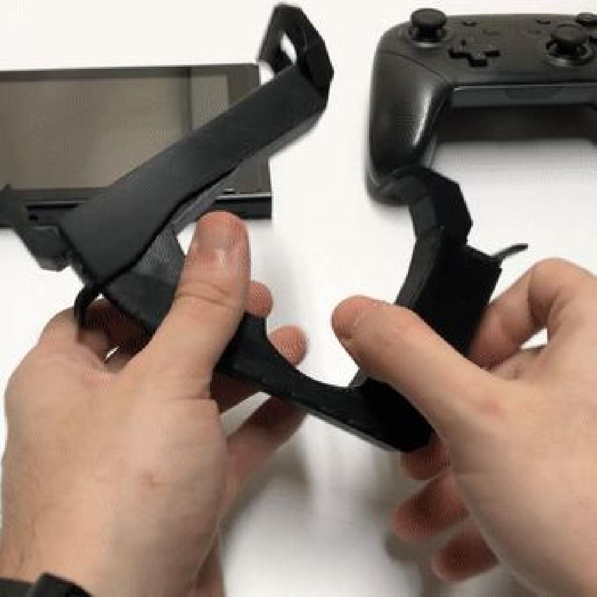 Suporte de controle PRO para Nintendo Switch usando mecanismo de travamento exclusivo