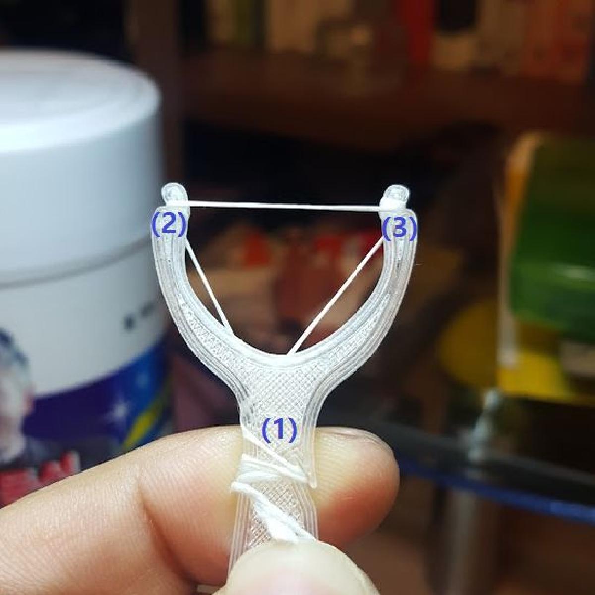pequeno porta fio dental