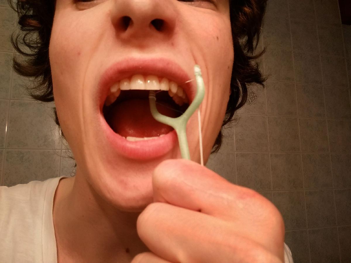 Ajudante de Fio Dental 