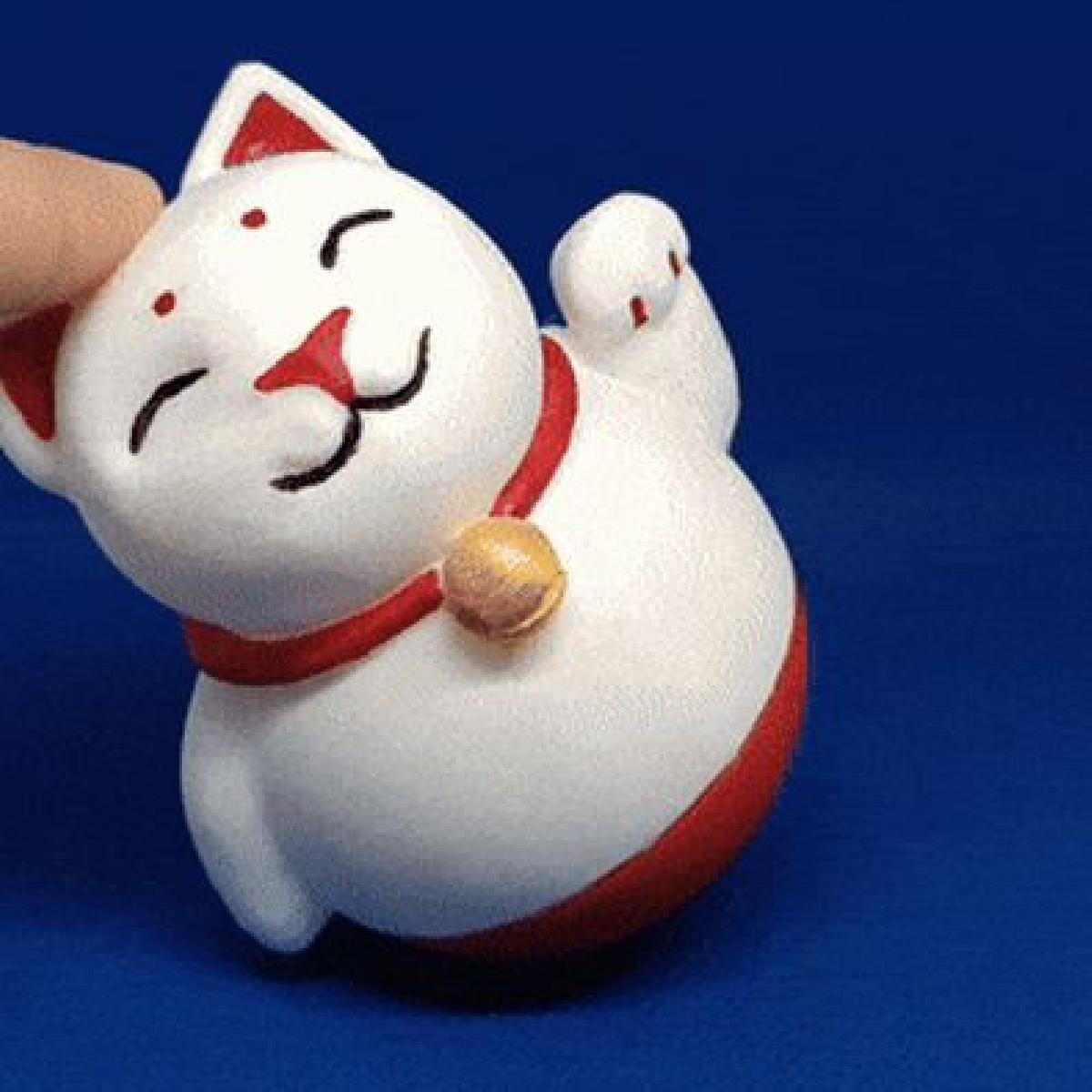 Gato da sorte, balanca, mas nao cai.