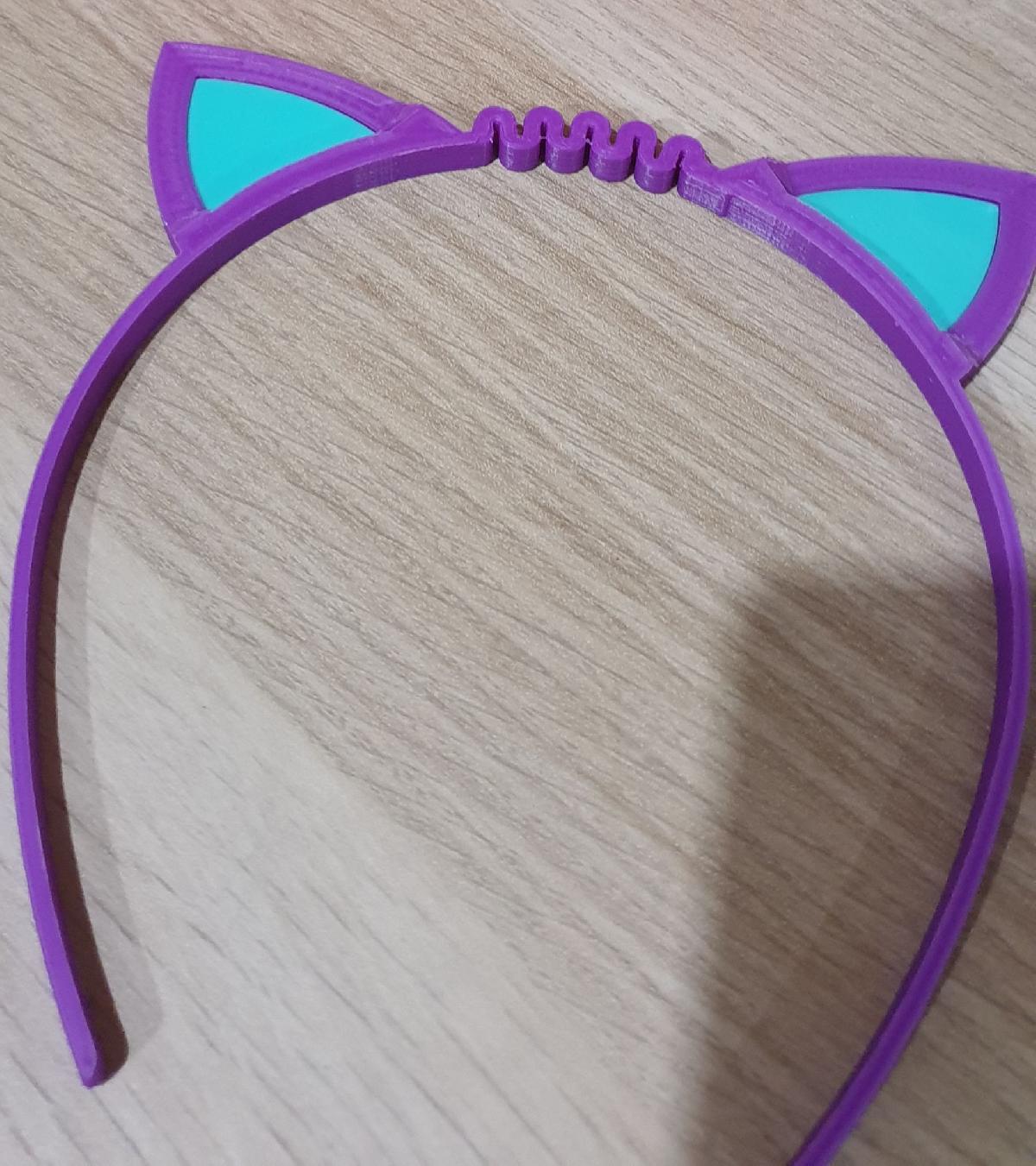 Diadema de gato flexivel com orelhas em outra cor.