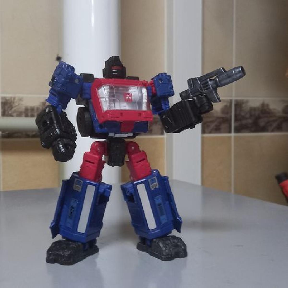 Arma do Sandstorm da trilogia WFC dos Transformers 5mm