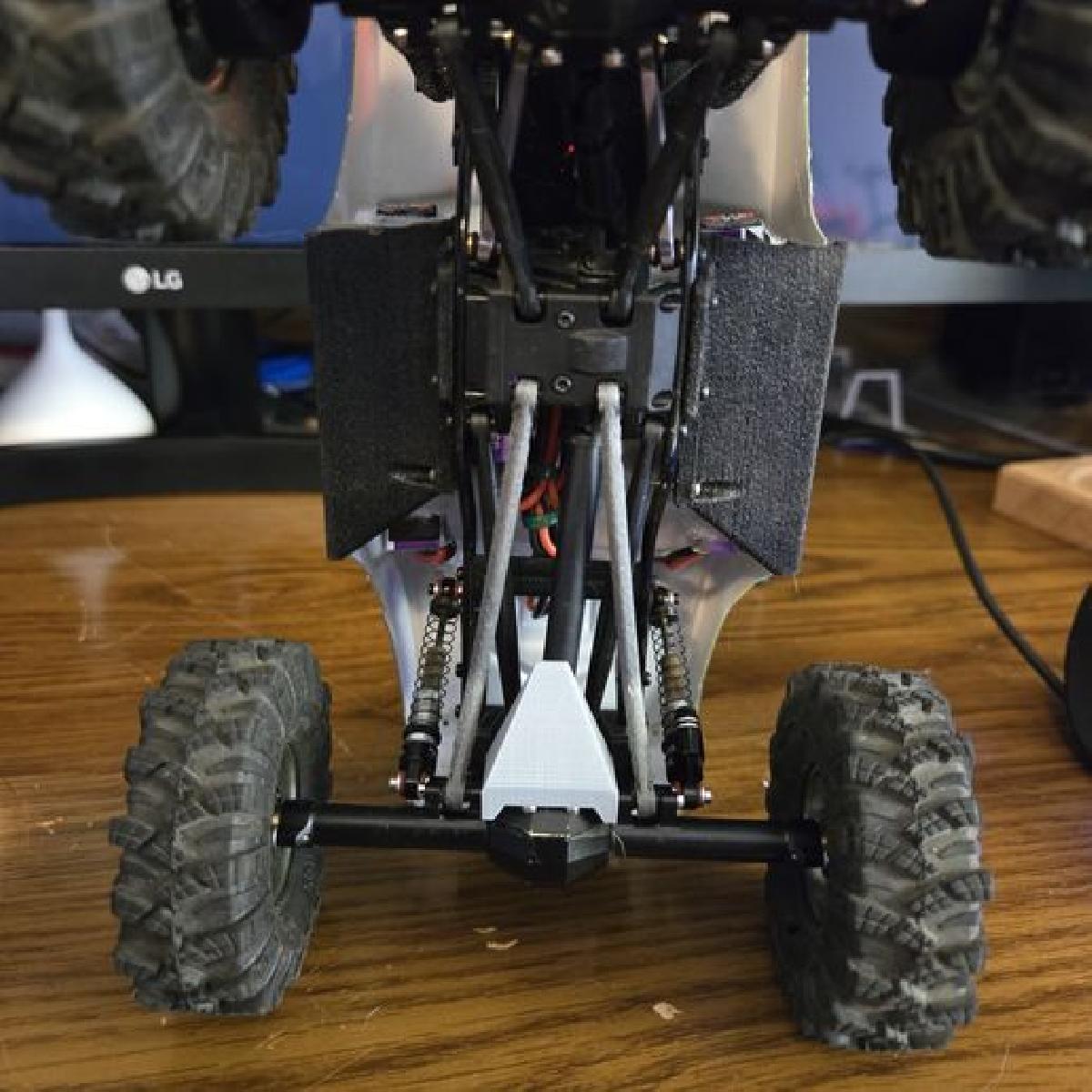 Placa de skid elevada para o eixo traseiro SCX 24 Meus.