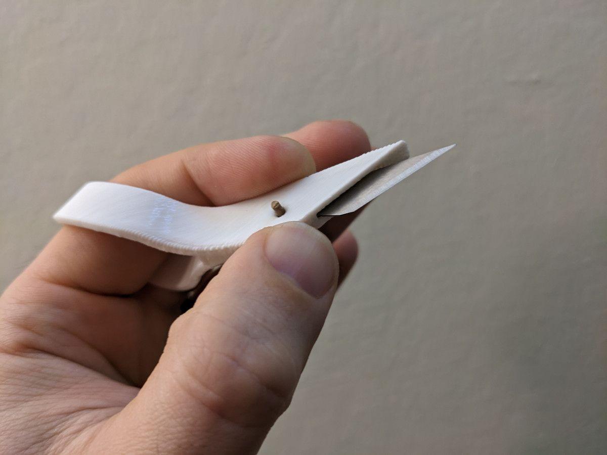 Porta lamina X Acto de ponta dos dedos