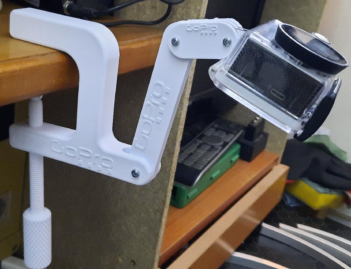 Braco GoPro para videocamera com morsa.