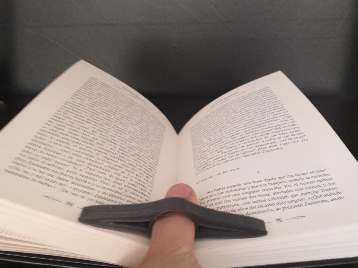 Sustentador de Livros com Uma Mao   Sujetador para livro