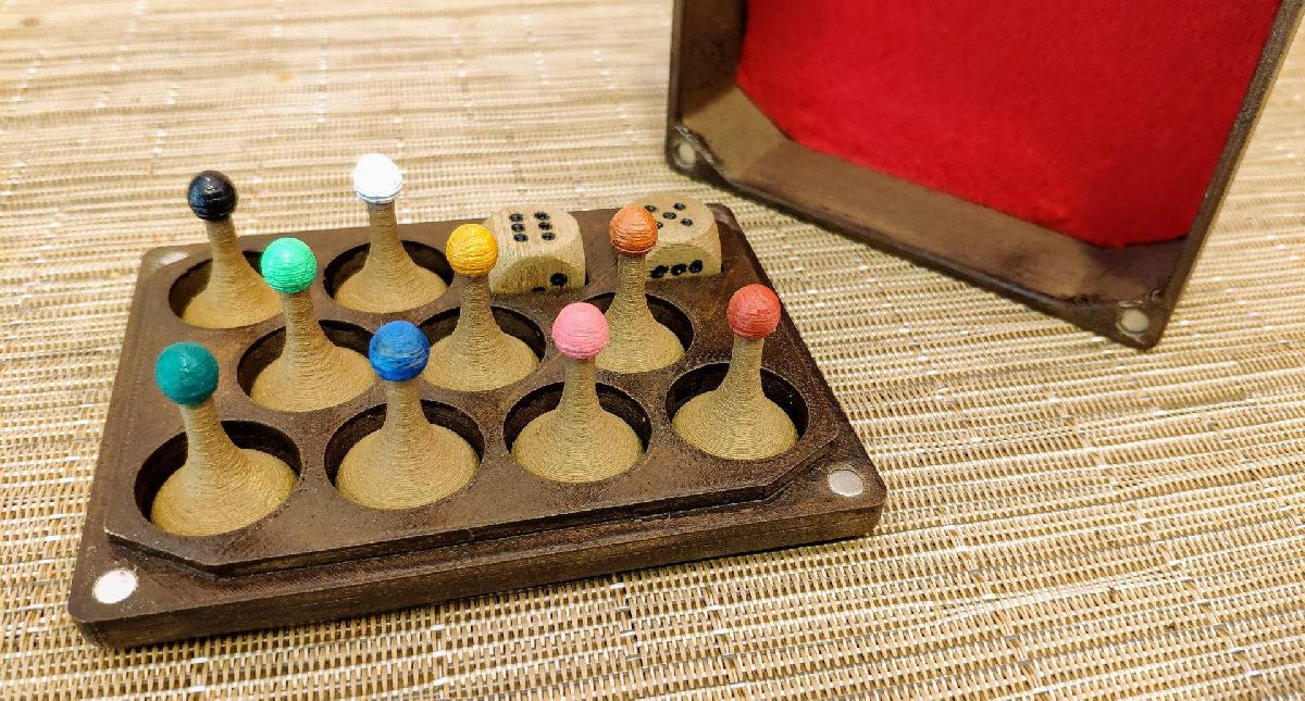 Caixa de pedine e dados