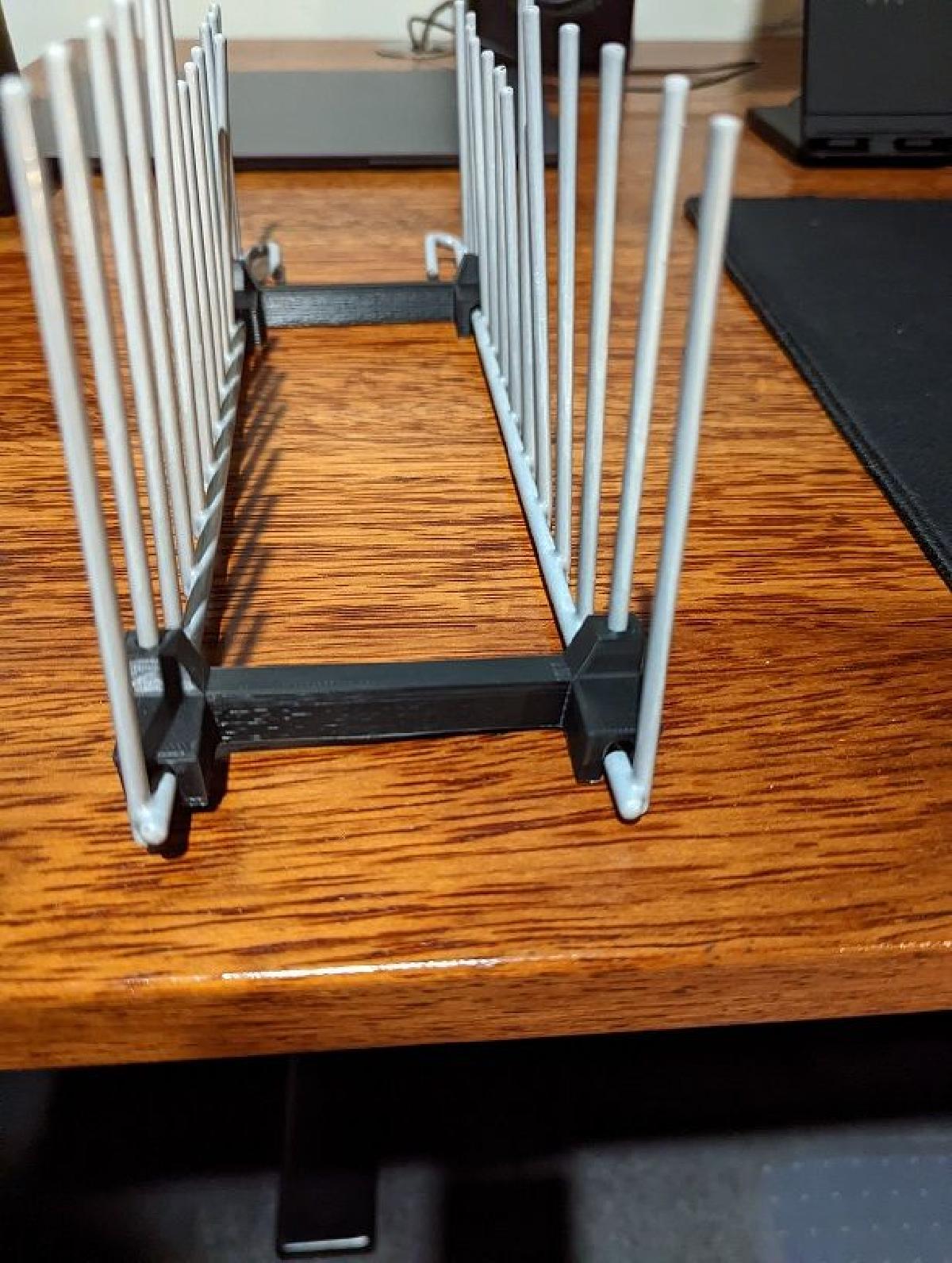 Suporte para prateleira de pratos da lavadora de loucas Fisher and Paykel.
