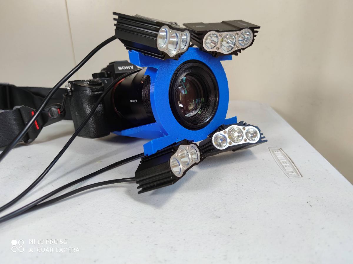 Adaptador de luzes de video para lente macro de 90mm da Sony.