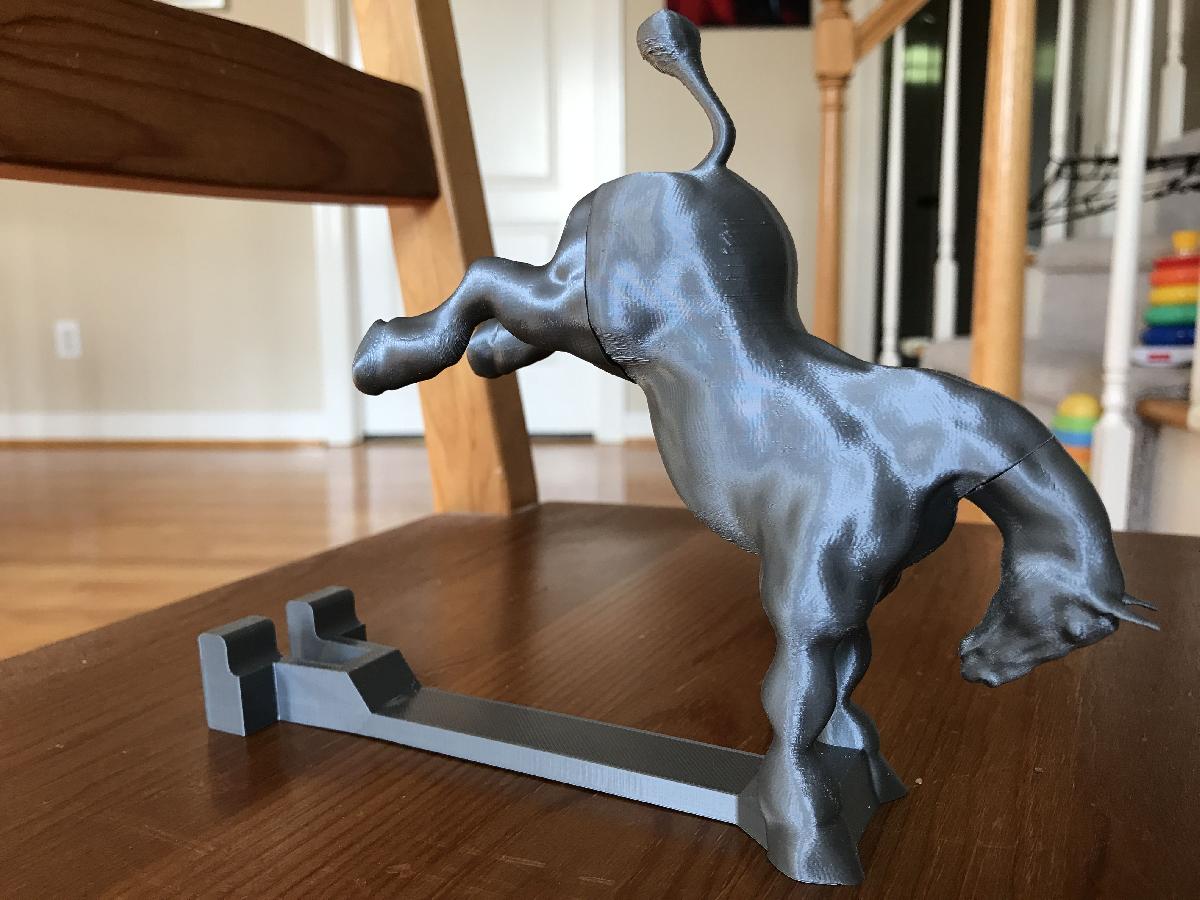 Suporte para telefone em formato de cavalo sem suporte.